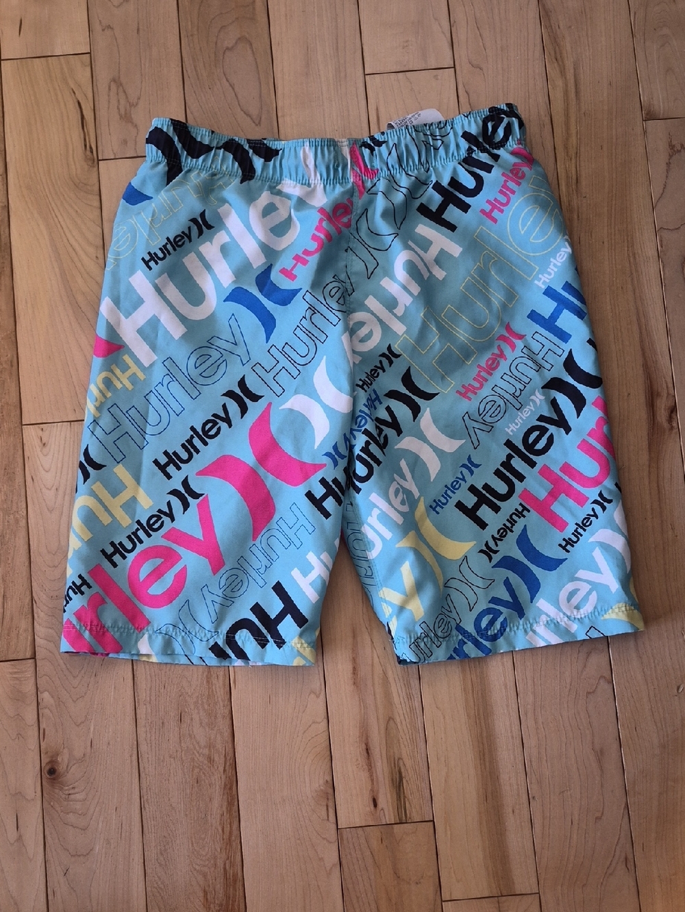 Boys Size 12 Hurley Light Blue Swim Shorts with Multicolor Logo Print